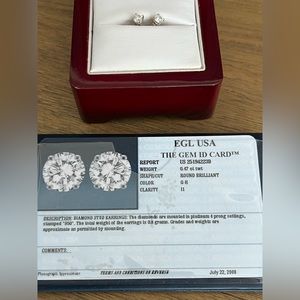 Diamond studs, set in platinum I1, G-H color